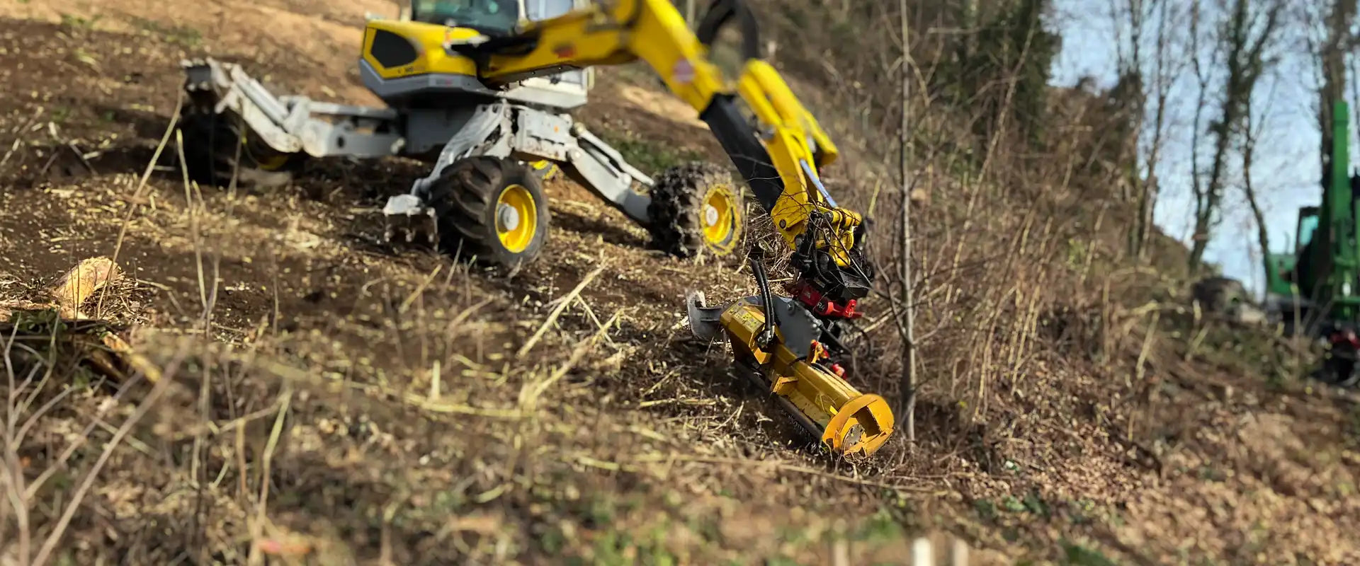 Menzi Muck beim Forstmulchen – Banner zur Kategorie Forstmulchen